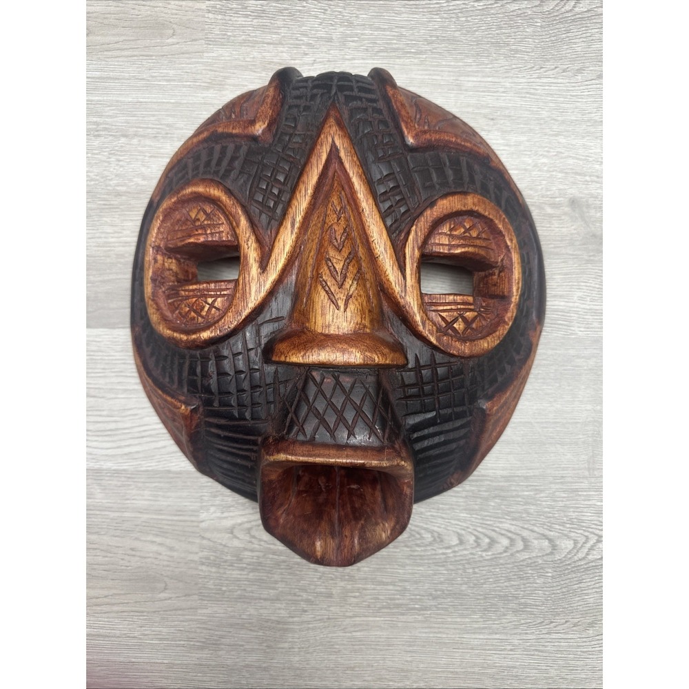 Handcrafted African wooden tribal mask originating from Ghana Geometric Patterns